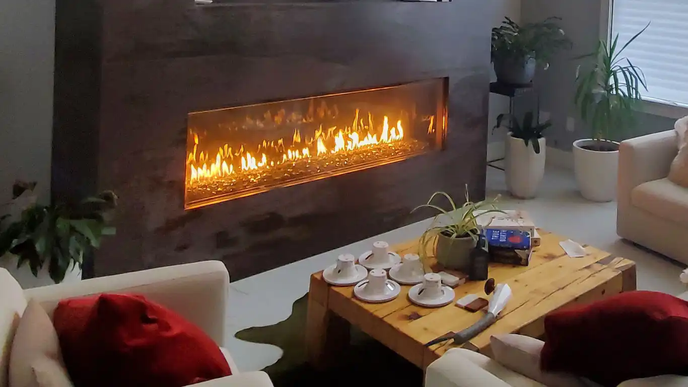a custom single sided gas fireplace with linear view in a modern living room
