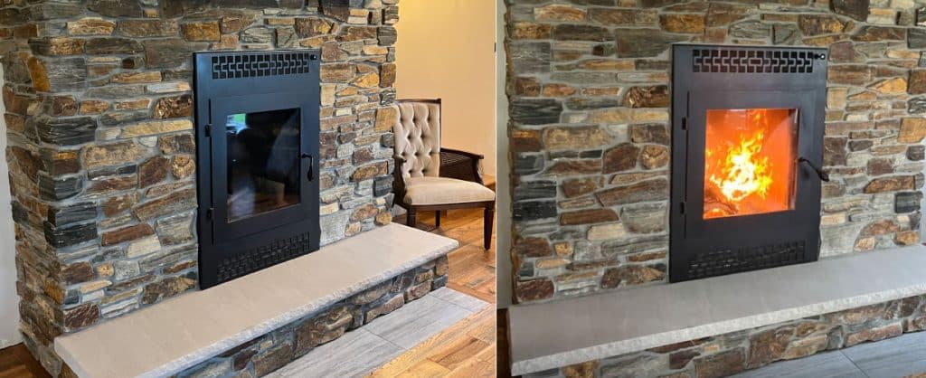 an image of a traditional front facing wood burning fireplace 