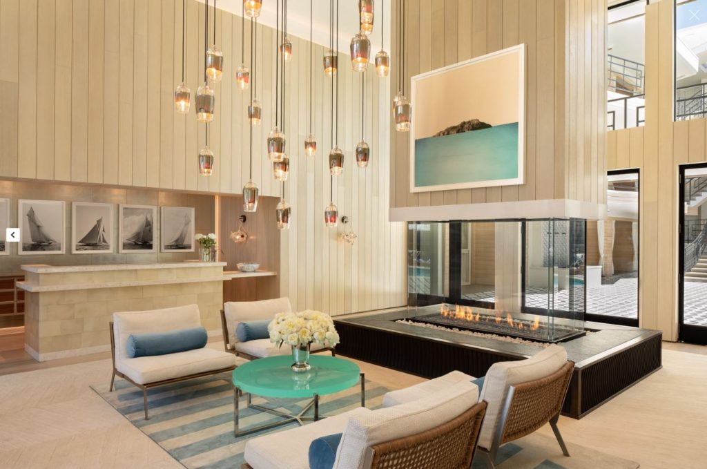 A luxurious custom gas fireplace acting as a striking centerpiece in a sophisticated living space.