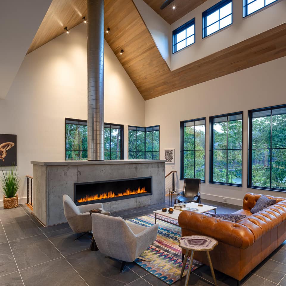 A minimalist gas fireplace with clean, smokeless flames, offering an environmentally friendly alternative to wood-burning fireplaces.