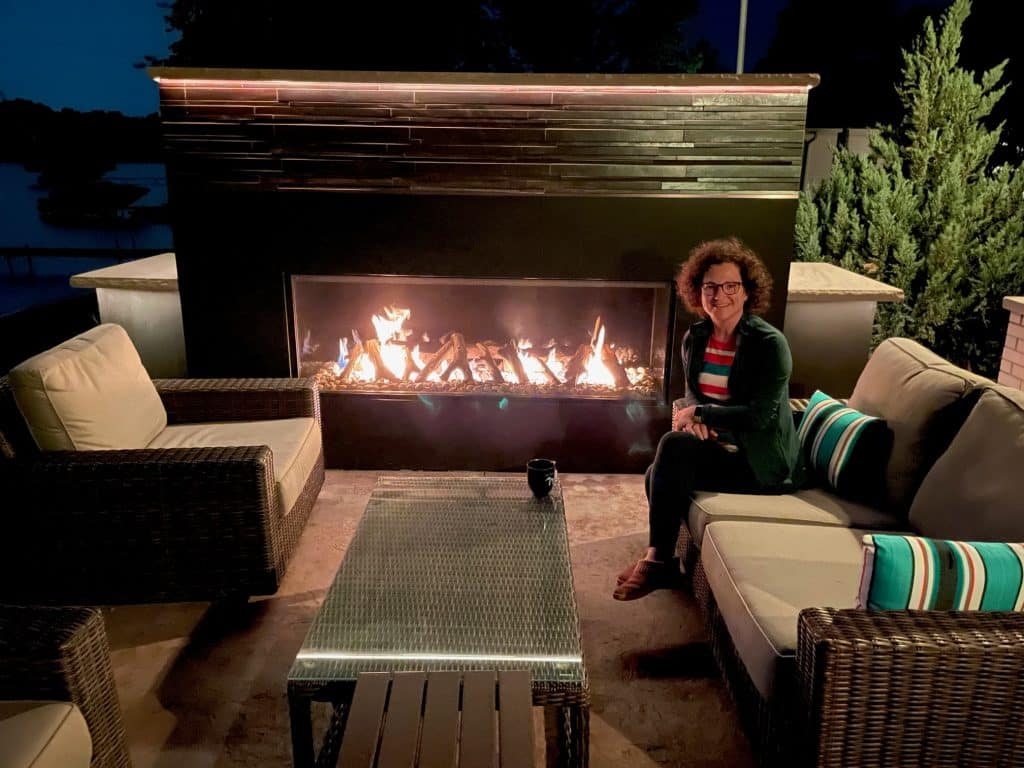 Modern outdoor patio with Blaze Outdoor Gas Fireplace.