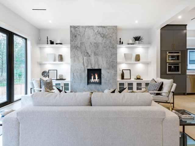 acucraft vertical direct vent gas fireplace with stone accents modern white and gray living room with tall vertical direct vent gas fireplace with stone media