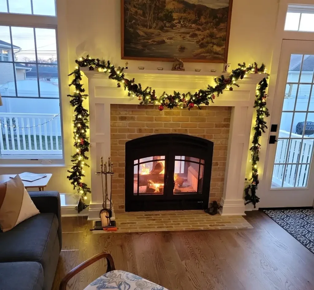 Festive-holiday-wreath-on-view-through-fireplace