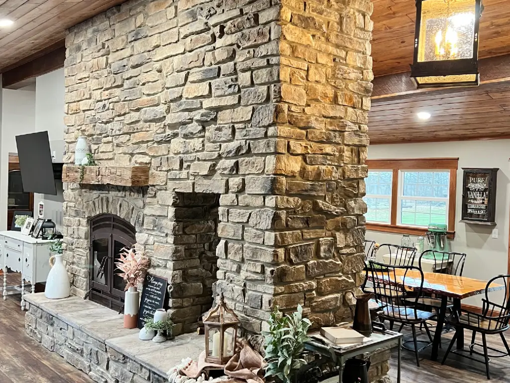 Hearthroom 36 See Through Wood Fireplace with Patina Finish and Arched Front and Doors