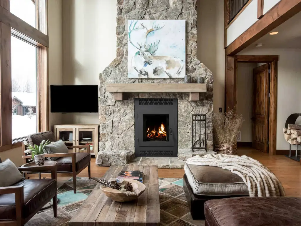 Acucraft American single-sided wood fireplace in a rustic luxury living room