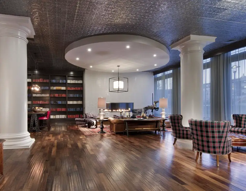 Wide view of an Acucraft Blaze standard single-sided gas fireplace in a spacious room