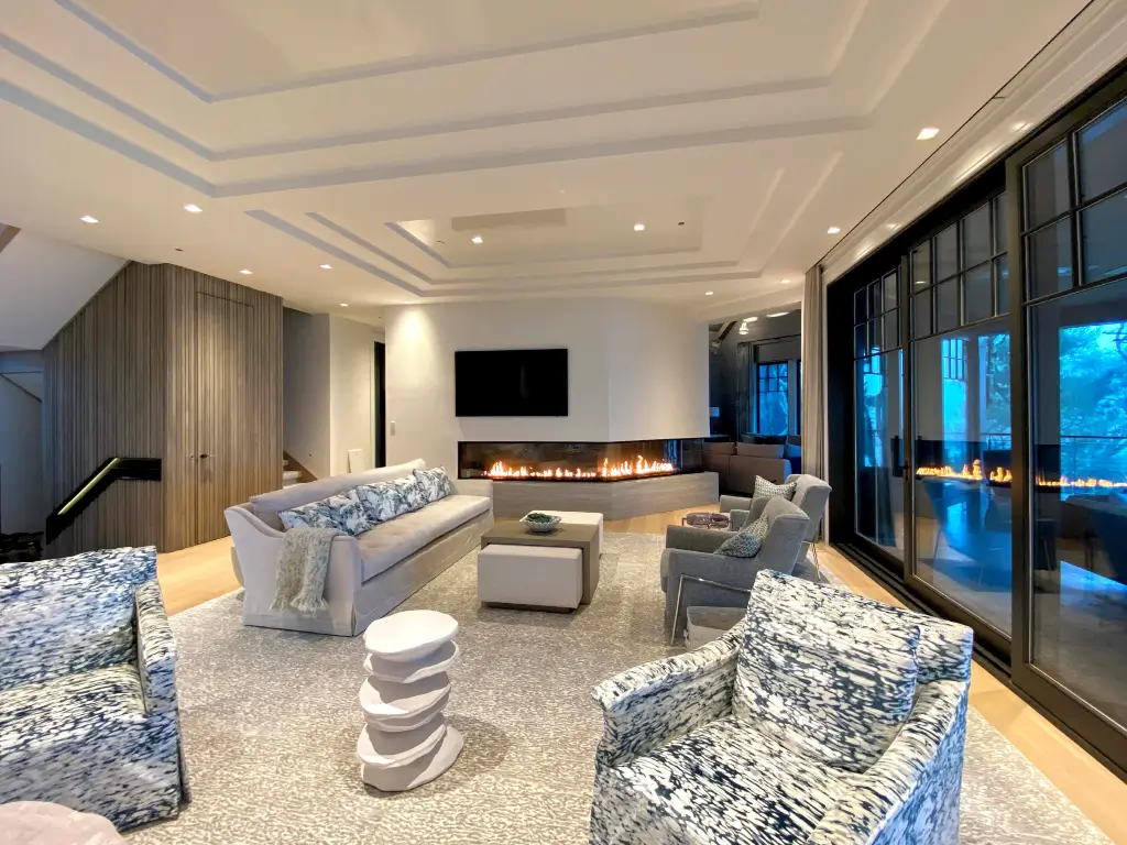 Acucraft custom gas front-right view fireplace in a modern living room