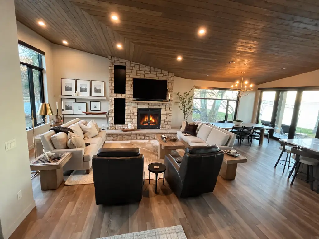 Acucraft wood fireplace in an open-plan living and dining room